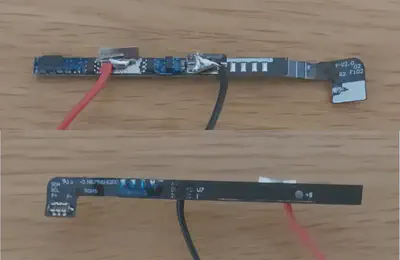 Front and back of a battery BMS circuit with custom wires soldered on